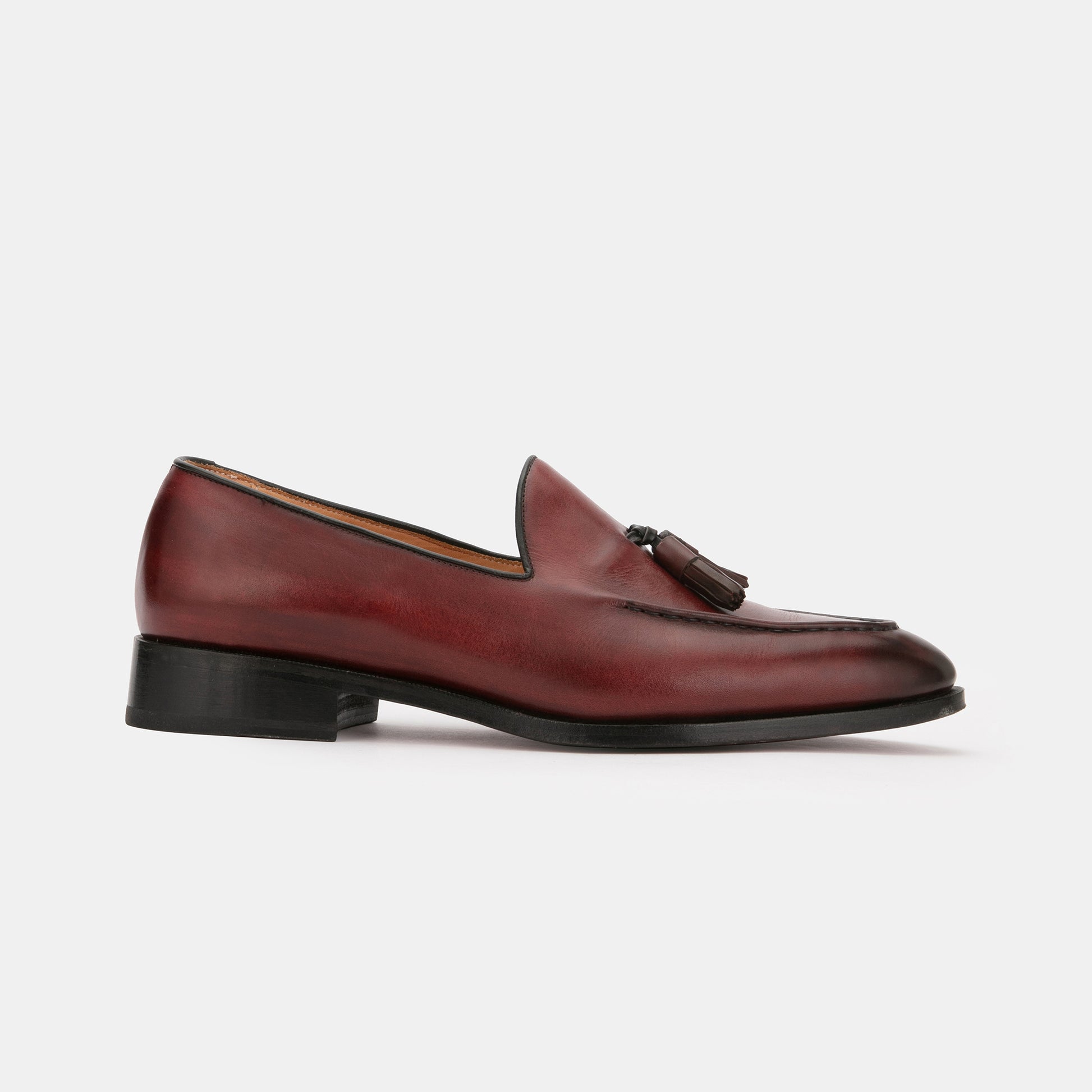 The Tassel Loafer - red pattina / black piping